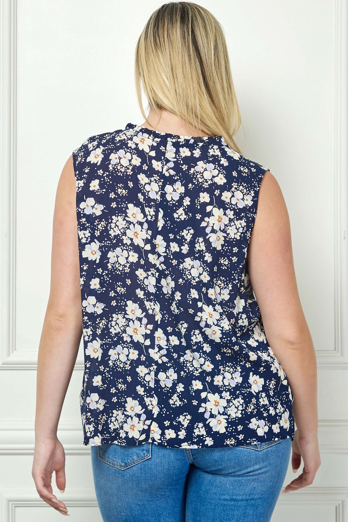 Dressbarn Trending | Sleeveless Ruffle Split Neck Tassel Blouse in Navy - Plus